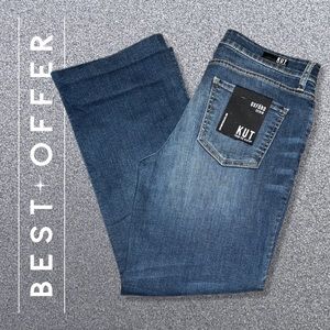 KUT from the Kloth jeans. Button came off, original button included with pics.